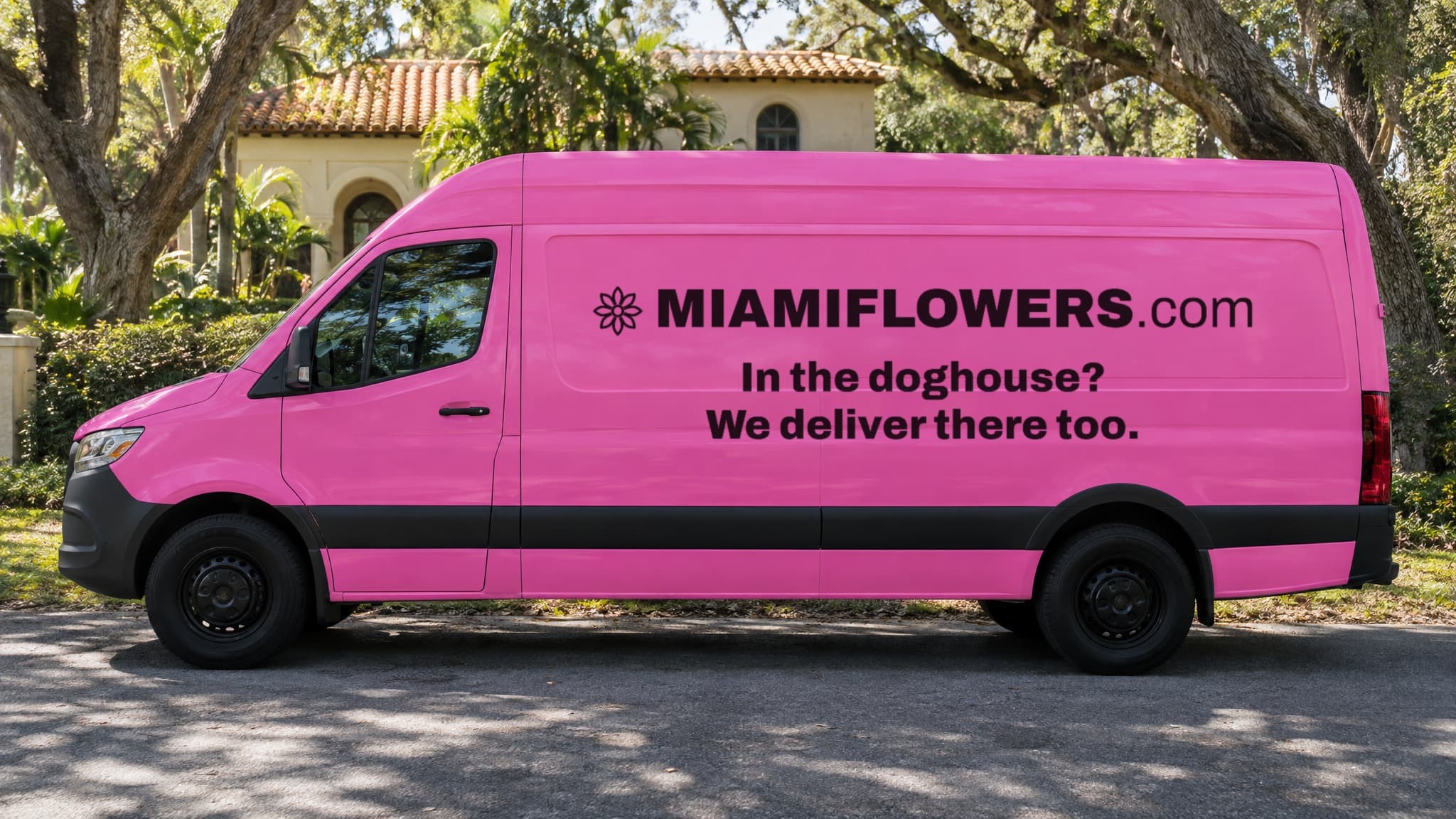 Pink MIAMIFLOWERS.com Sprinter van in Coral Gables with a doghouse slogan